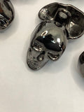 Metal skull shank buttons